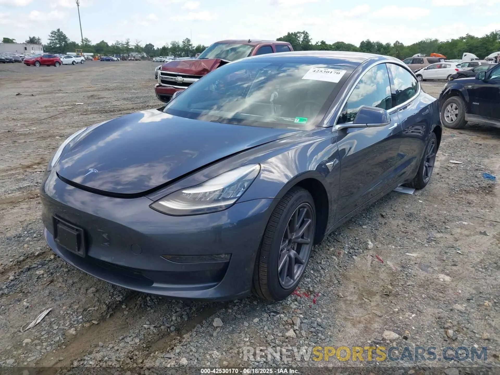 2 fotografías del automóvil dañado 5YJ3E1EB1KF205720 TESLA MODEL 3 2019