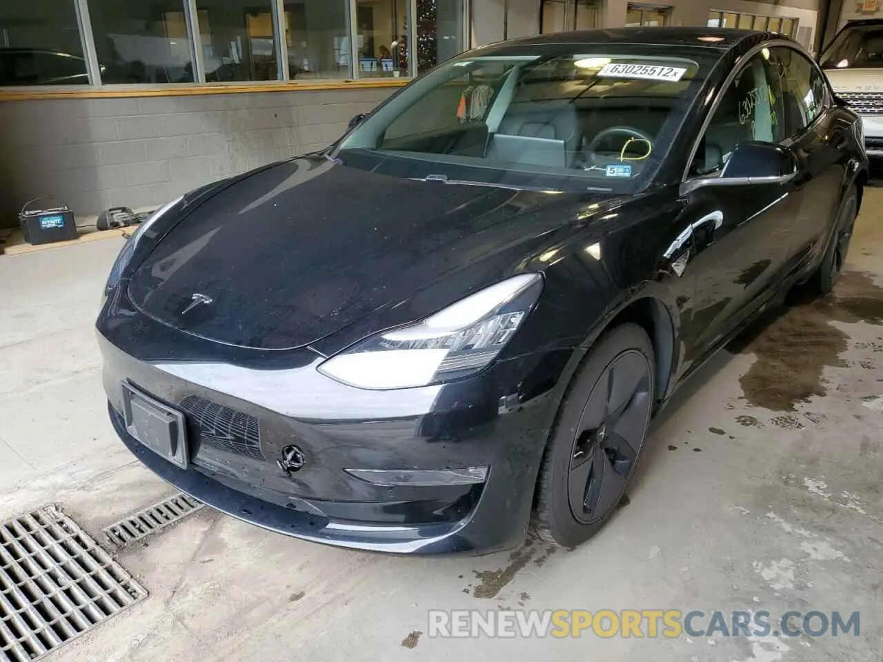 2 fotografías del automóvil dañado 5YJ3E1EB1KF208763 TESLA MODEL 3 2019