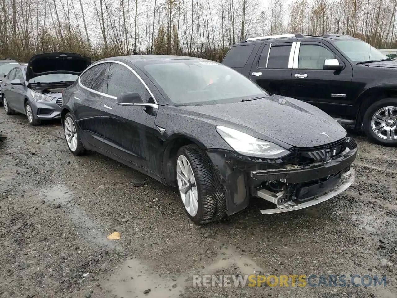 4 fotografías del automóvil dañado 5YJ3E1EB1KF388584 TESLA MODEL 3 2019