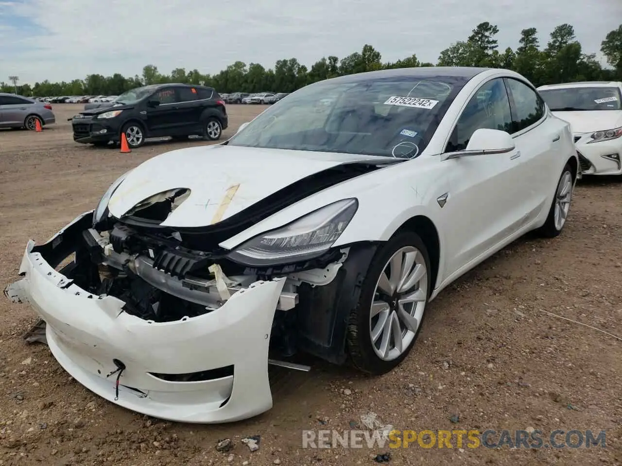 2 fotografías del automóvil dañado 5YJ3E1EB1KF390125 TESLA MODEL 3 2019