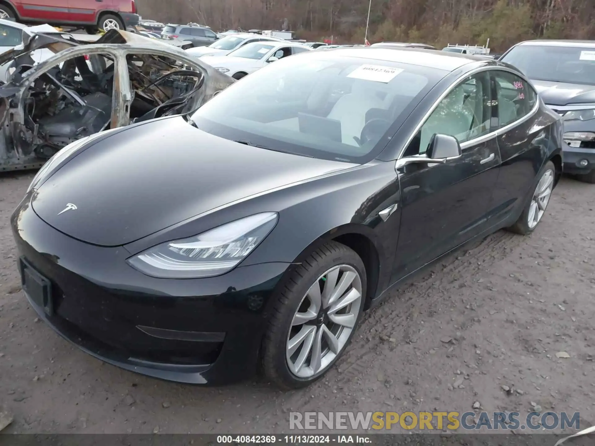 2 fotografías del automóvil dañado 5YJ3E1EB1KF391453 TESLA MODEL 3 2019