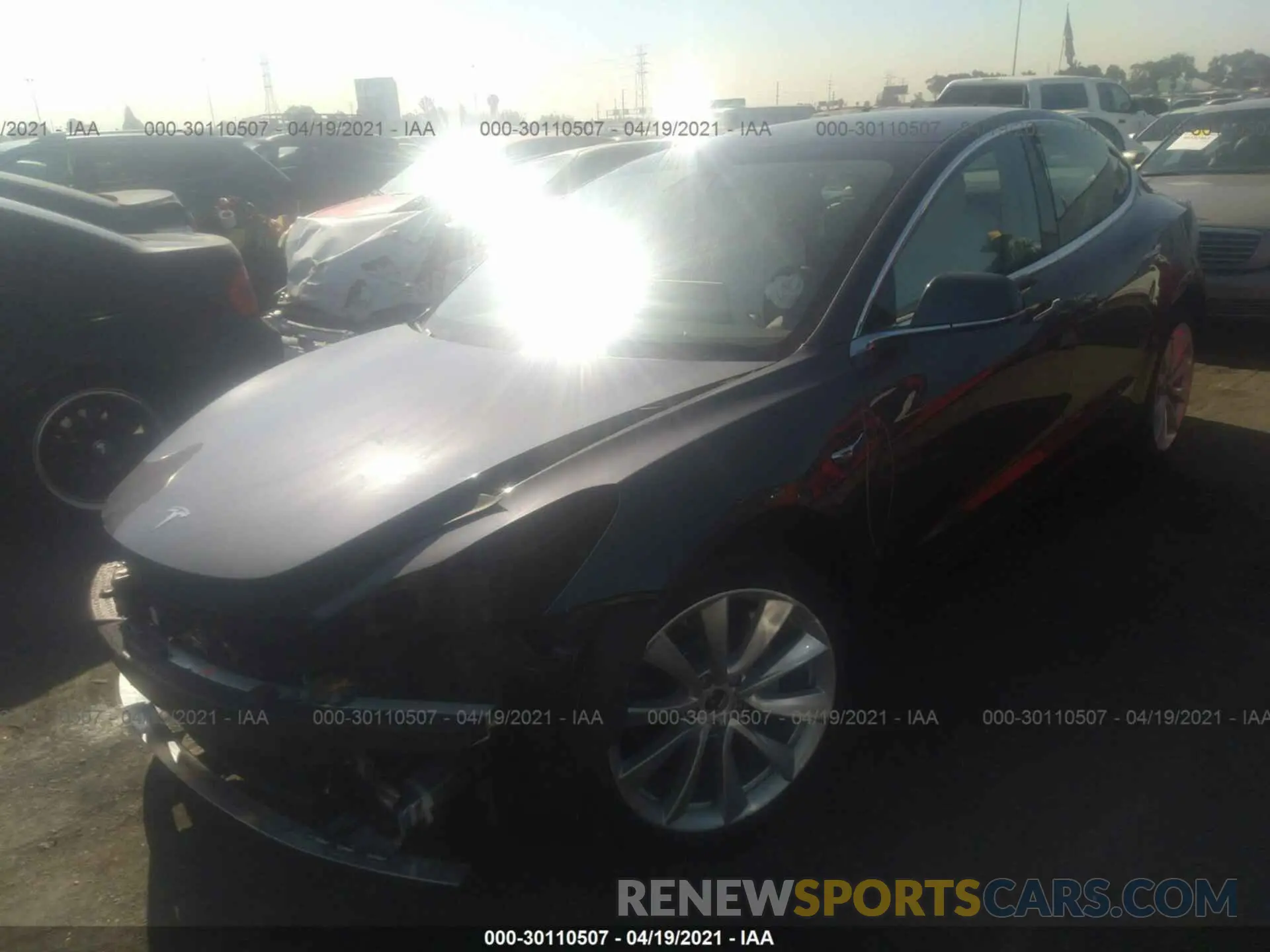 2 fotografías del automóvil dañado 5YJ3E1EB1KF391727 TESLA MODEL 3 2019