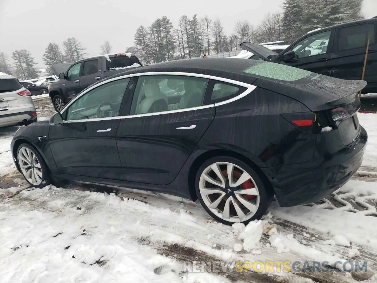 2 fotografías del automóvil dañado 5YJ3E1EB1KF407053 TESLA MODEL 3 2019
