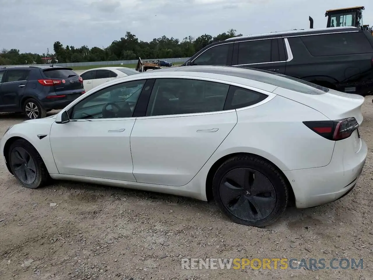 2 fotografías del automóvil dañado 5YJ3E1EB1KF493805 TESLA MODEL 3 2019