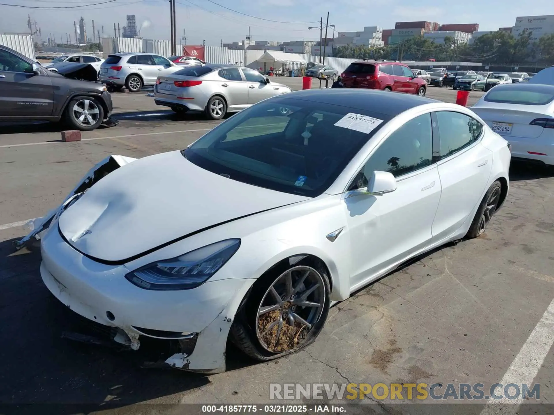2 fotografías del automóvil dañado 5YJ3E1EB1KF510912 TESLA MODEL 3 2019