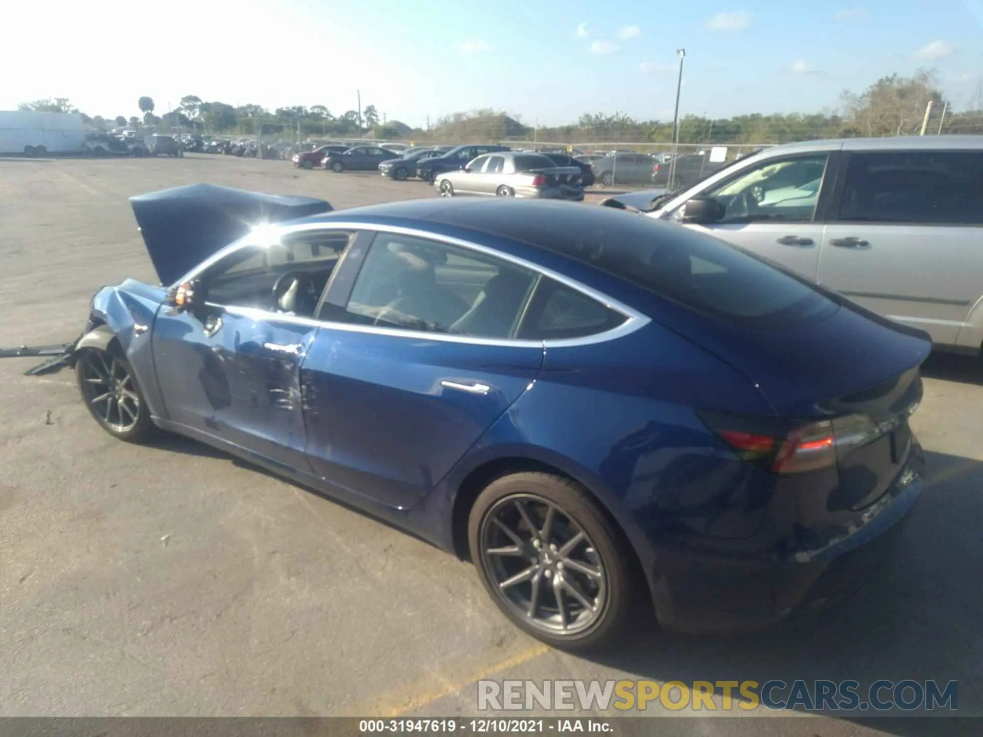 3 fotografías del automóvil dañado 5YJ3E1EB2KF191410 TESLA MODEL 3 2019
