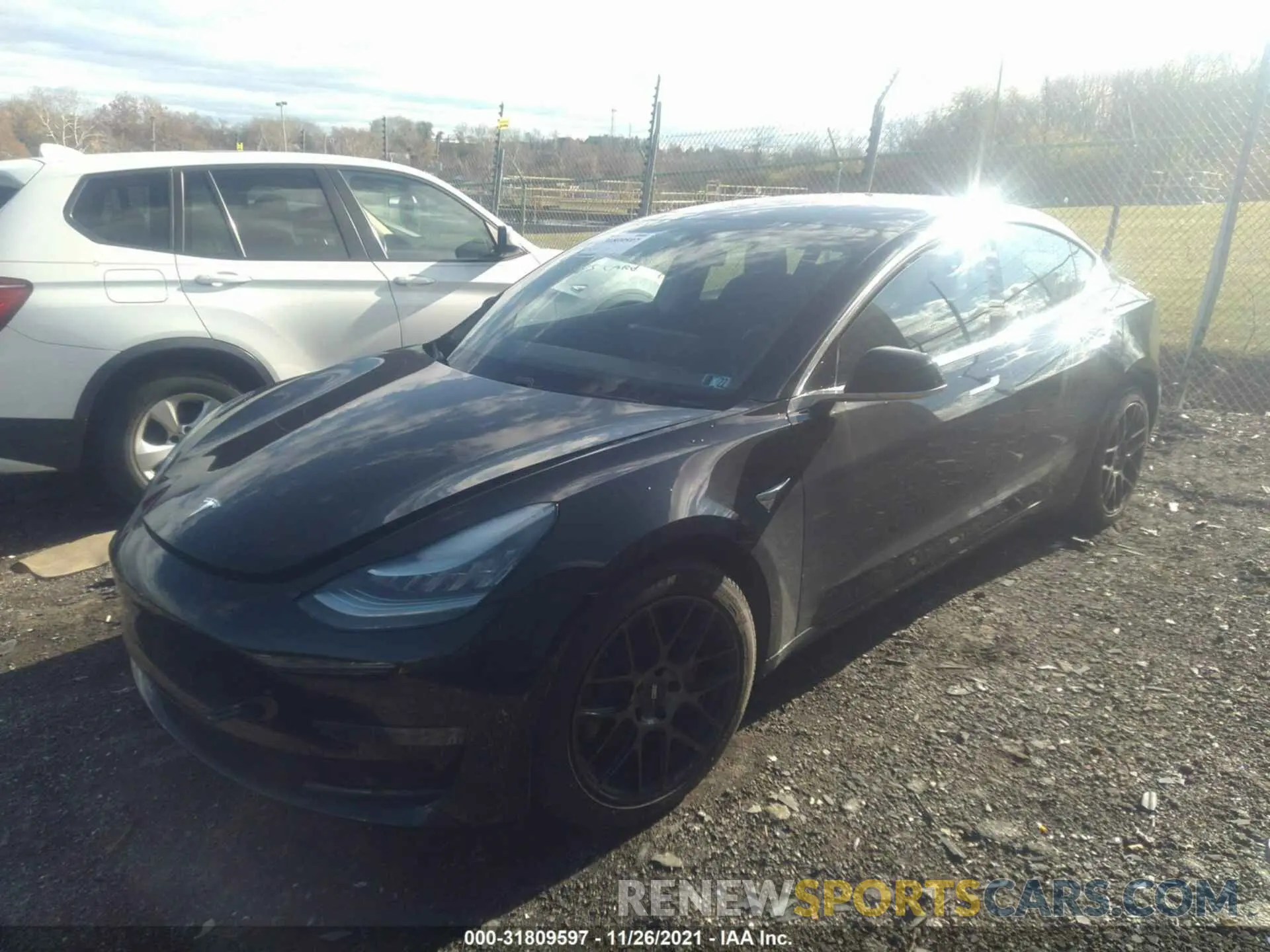 2 fotografías del automóvil dañado 5YJ3E1EB2KF213969 TESLA MODEL 3 2019