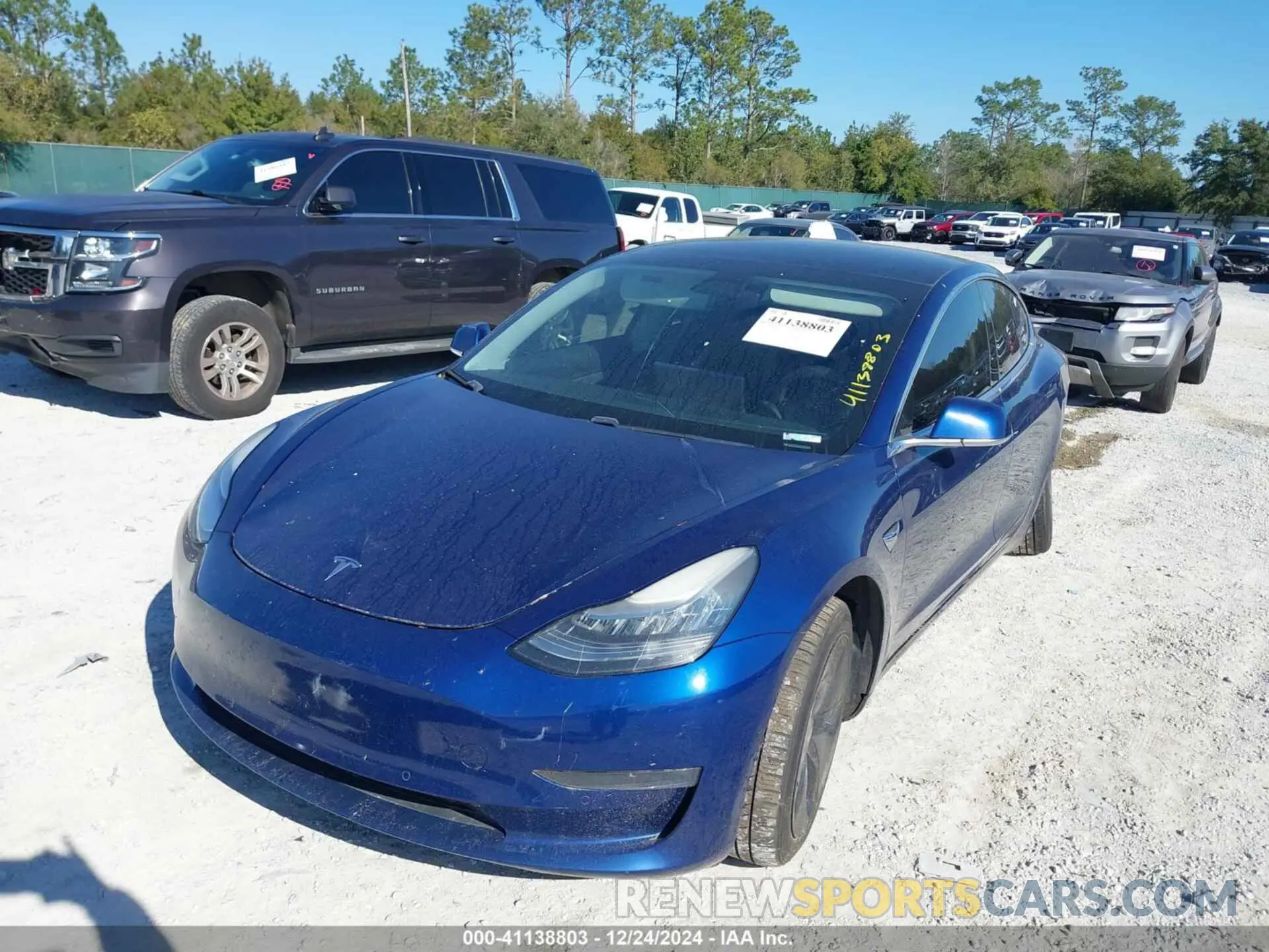 2 fotografías del automóvil dañado 5YJ3E1EB2KF437372 TESLA MODEL 3 2019
