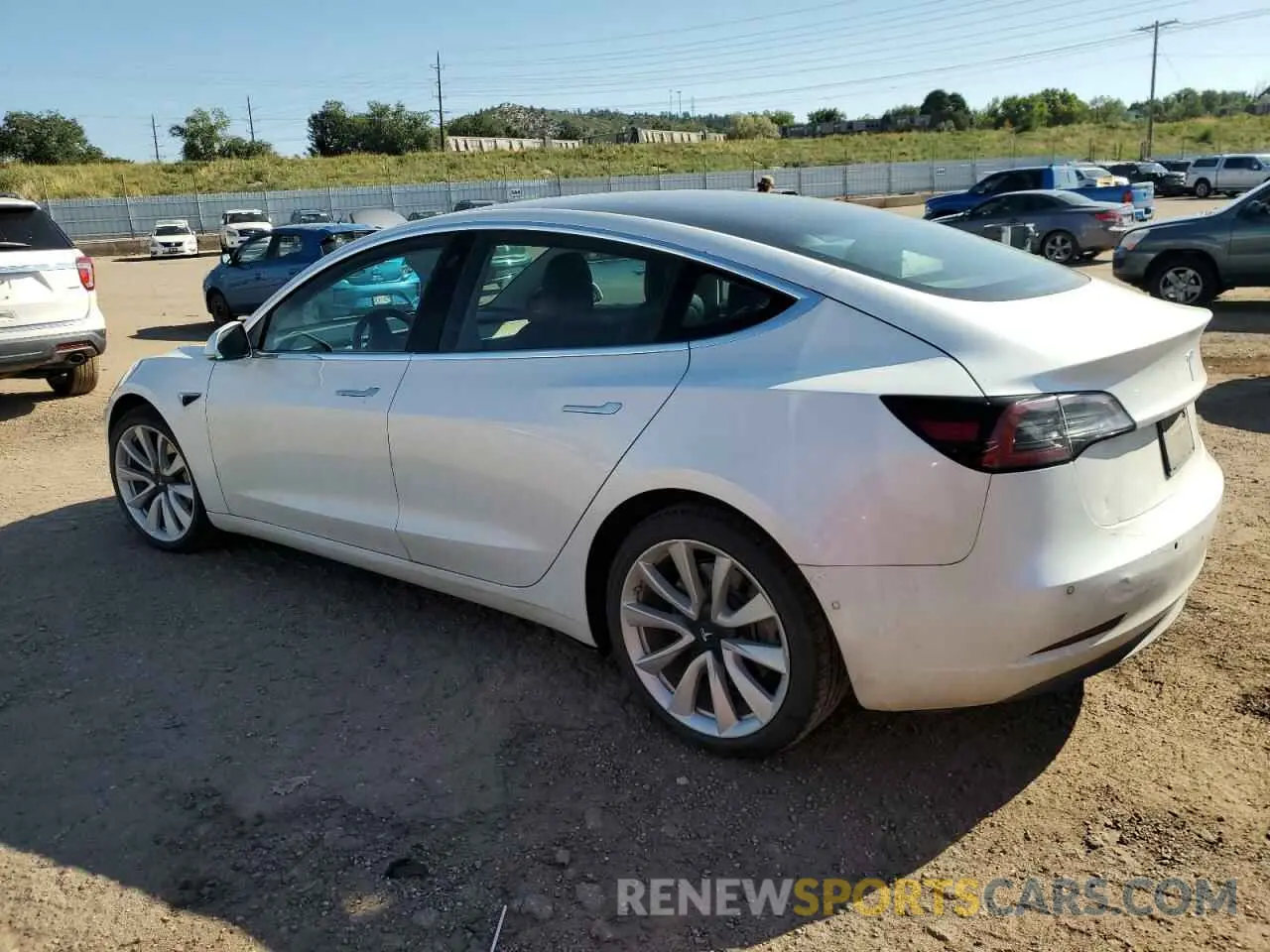 2 fotografías del automóvil dañado 5YJ3E1EB2KF437498 TESLA MODEL 3 2019