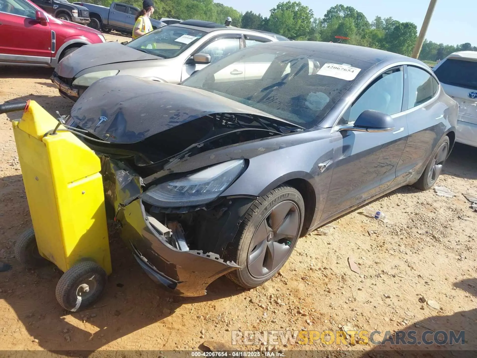 2 fotografías del automóvil dañado 5YJ3E1EB2KF510398 TESLA MODEL 3 2019