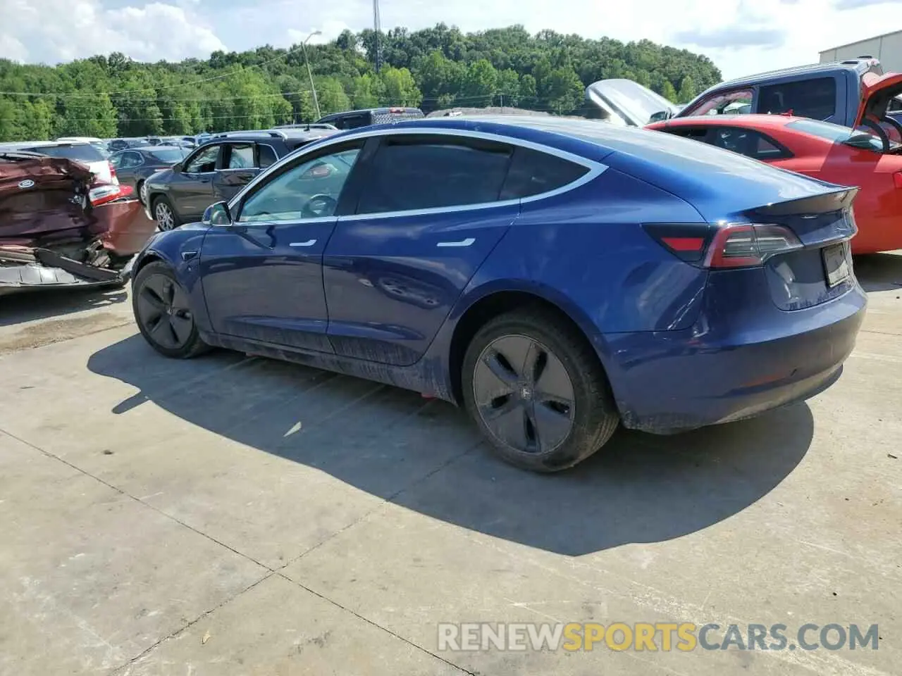 2 fotografías del automóvil dañado 5YJ3E1EB2KF533423 TESLA MODEL 3 2019