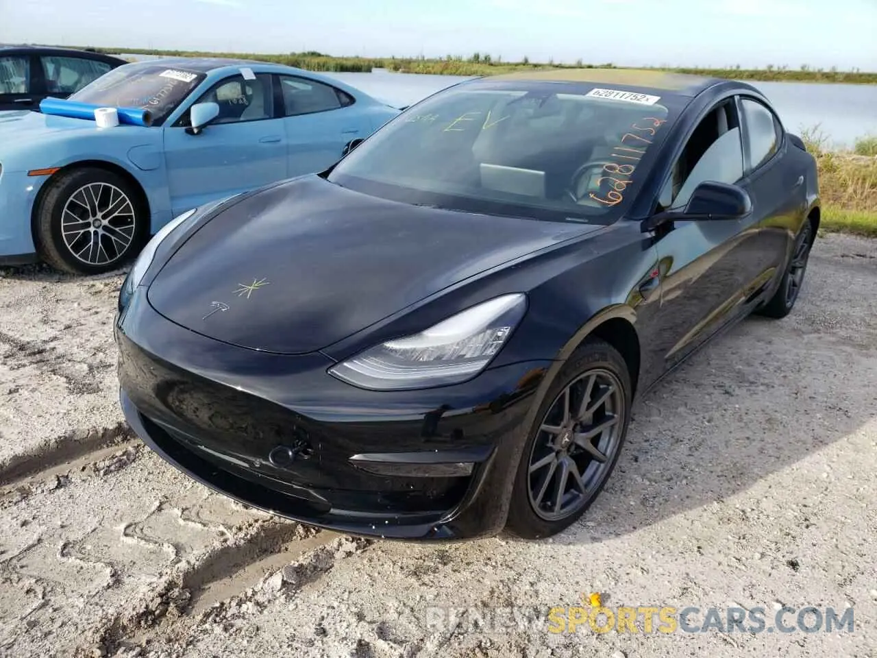 2 fotografías del automóvil dañado 5YJ3E1EB3KF365257 TESLA MODEL 3 2019