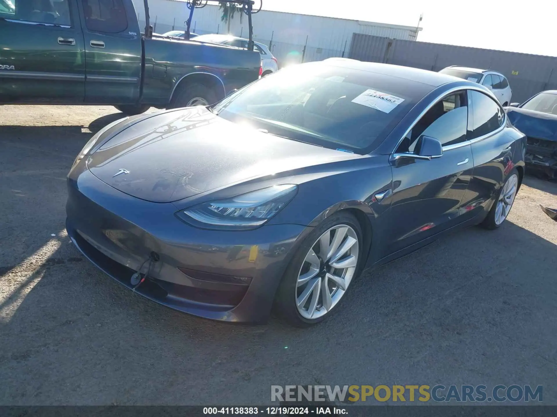 2 fotografías del automóvil dañado 5YJ3E1EB3KF406552 TESLA MODEL 3 2019