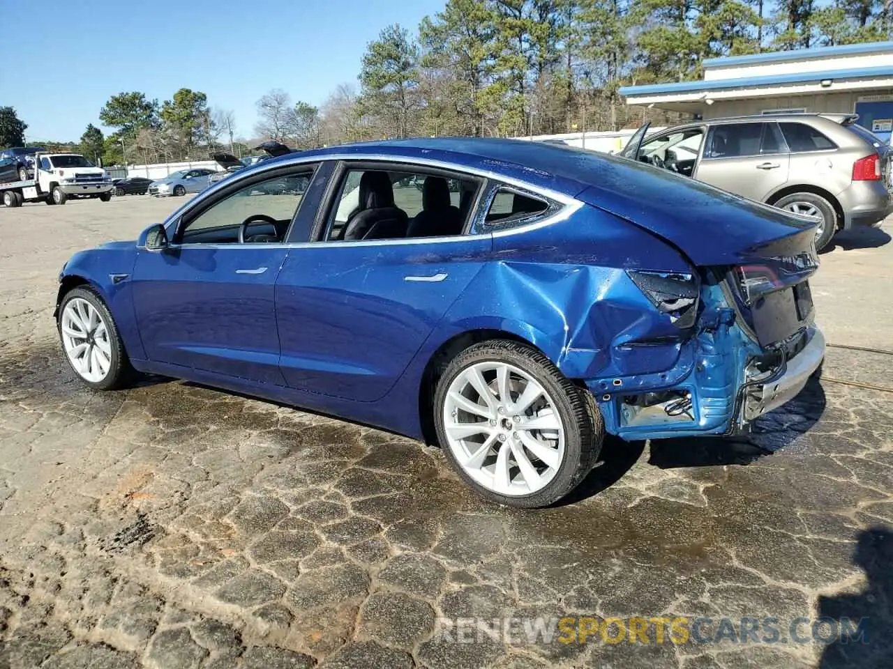 2 fotografías del automóvil dañado 5YJ3E1EB3KF423142 TESLA MODEL 3 2019