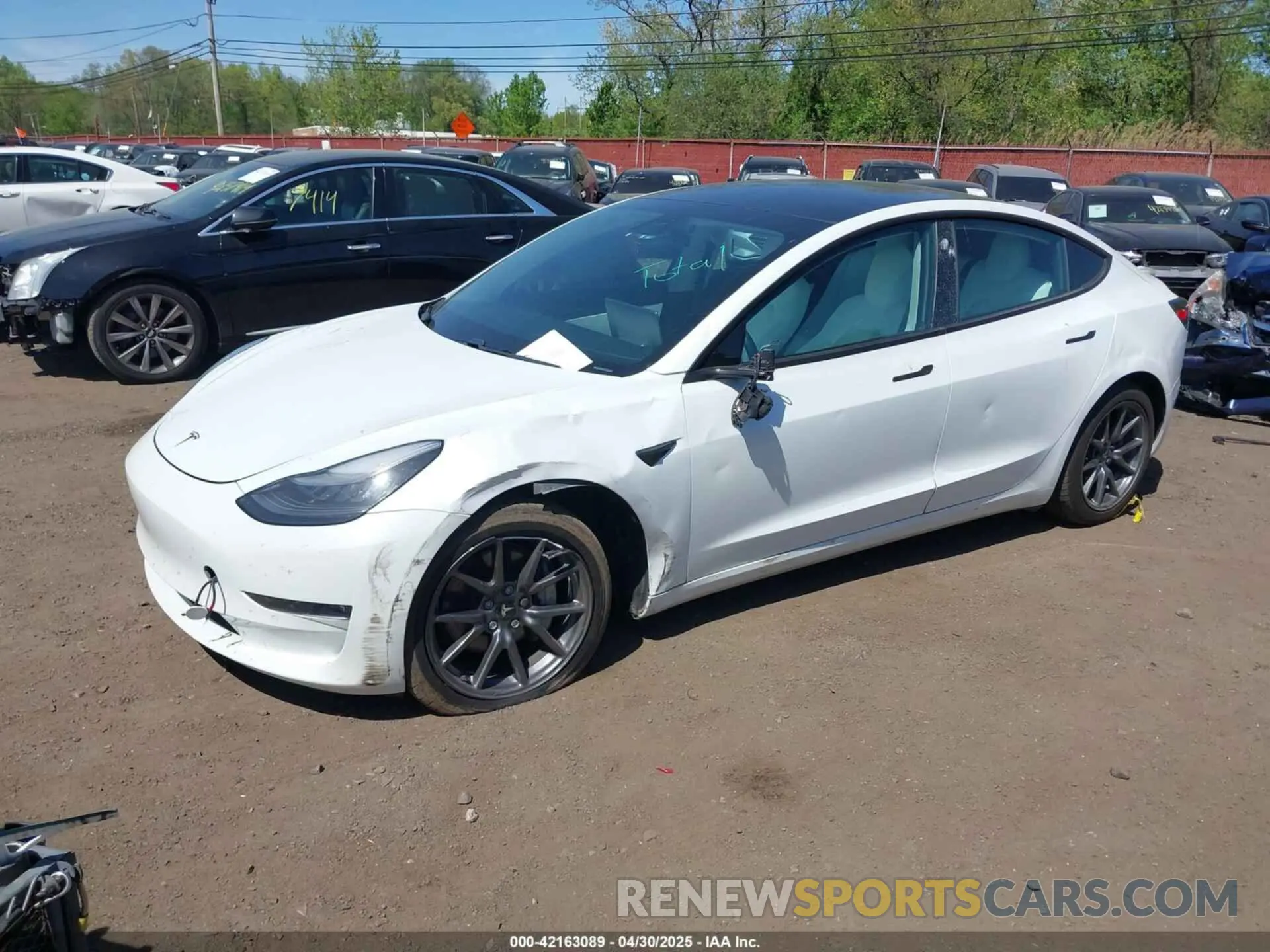 2 fotografías del automóvil dañado 5YJ3E1EB3KF450602 TESLA MODEL 3 2019