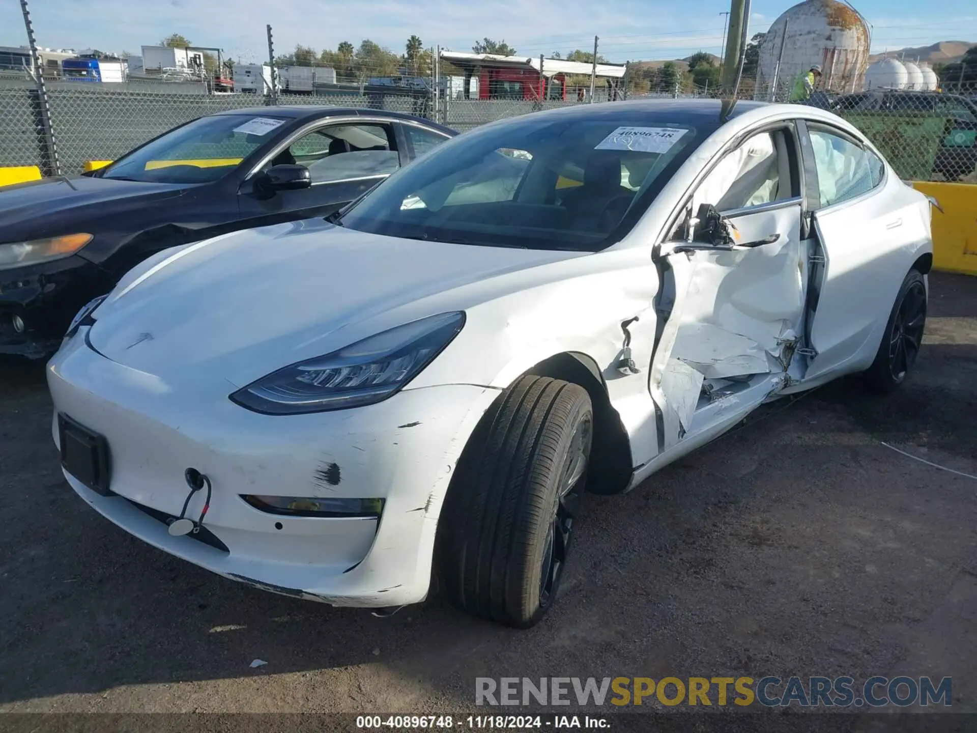 2 fotografías del automóvil dañado 5YJ3E1EB4KF194678 TESLA MODEL 3 2019