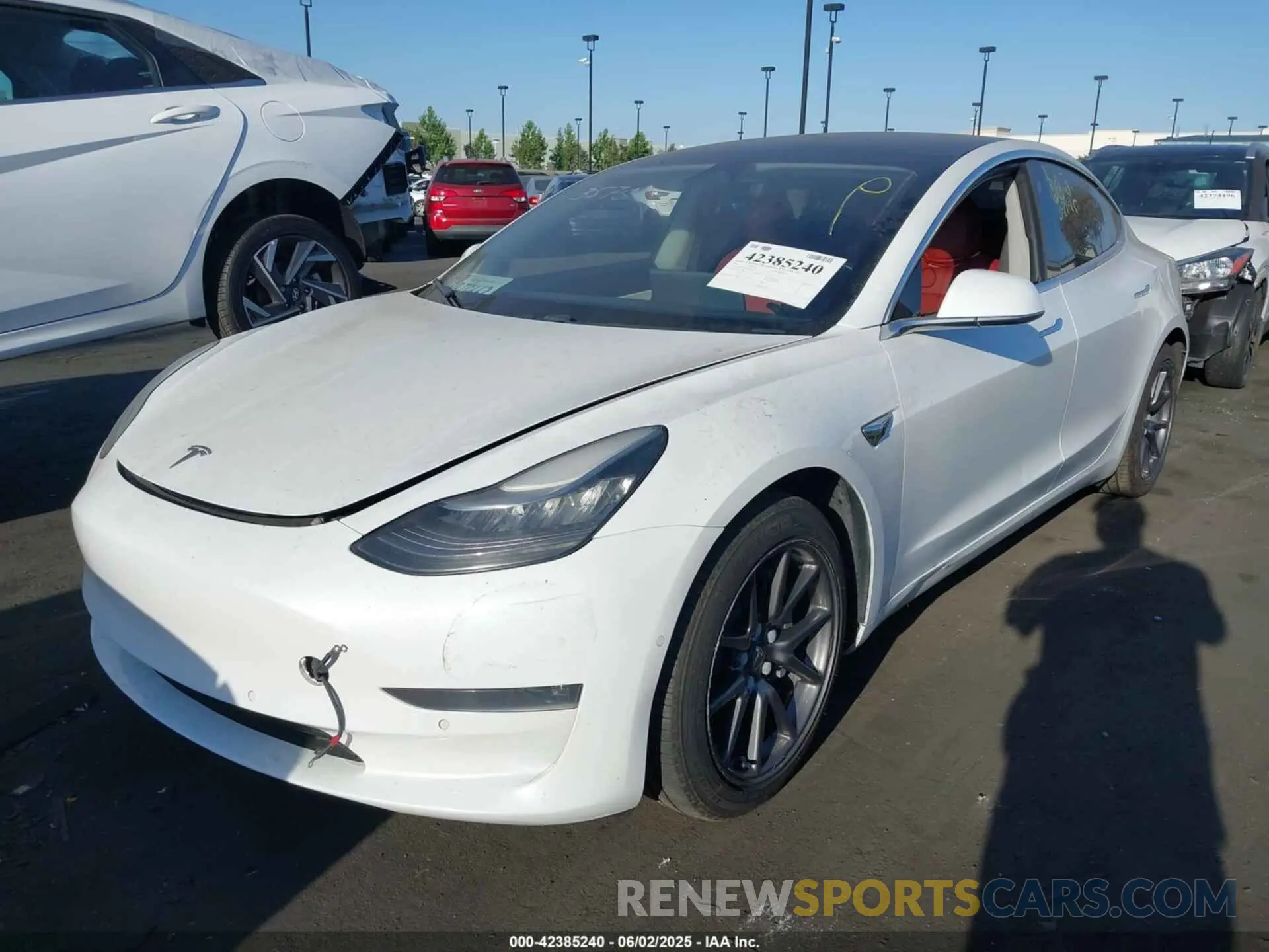 2 fotografías del automóvil dañado 5YJ3E1EB5KF213576 TESLA MODEL 3 2019