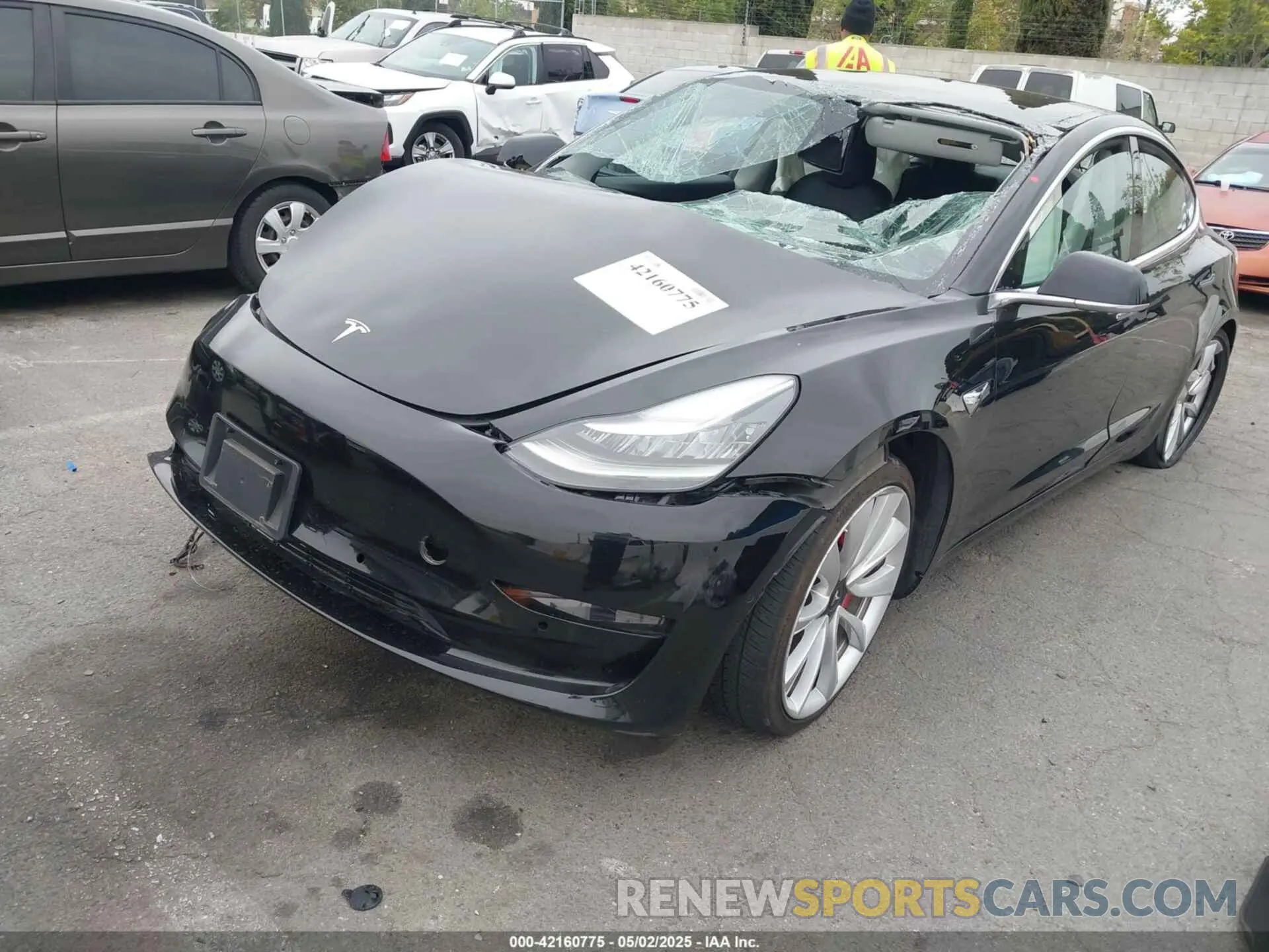 2 fotografías del automóvil dañado 5YJ3E1EB5KF434613 TESLA MODEL 3 2019