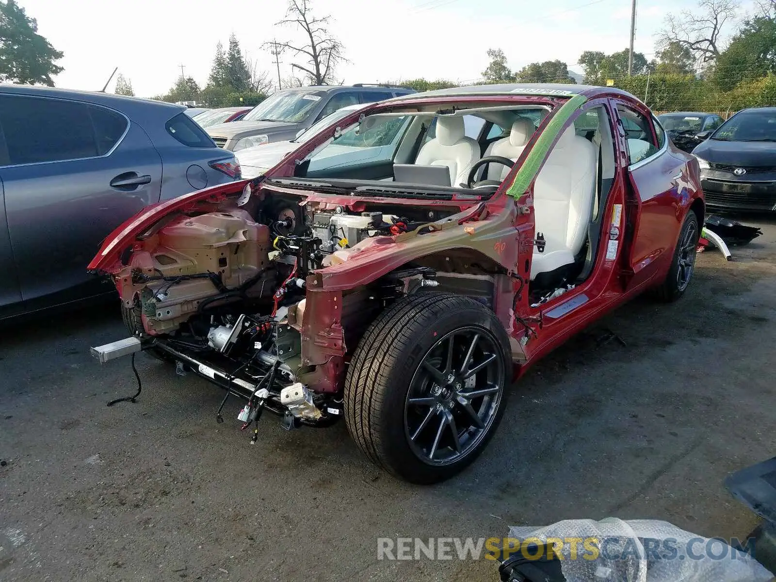 2 fotografías del automóvil dañado 5YJ3E1EB5KF533593 TESLA MODEL 3 2019