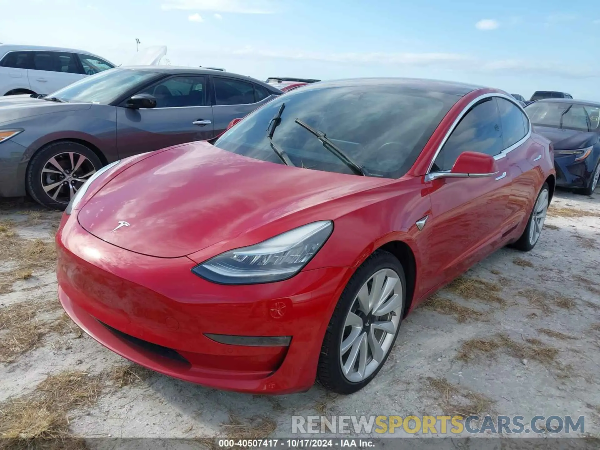 2 fotografías del automóvil dañado 5YJ3E1EB7KF194660 TESLA MODEL 3 2019