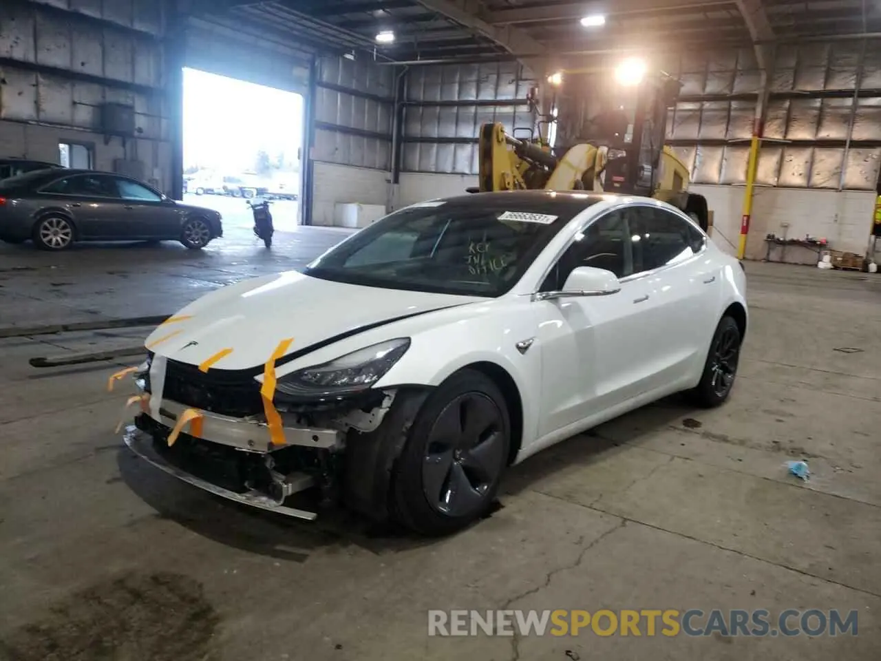 2 fotografías del automóvil dañado 5YJ3E1EB7KF433415 TESLA MODEL 3 2019