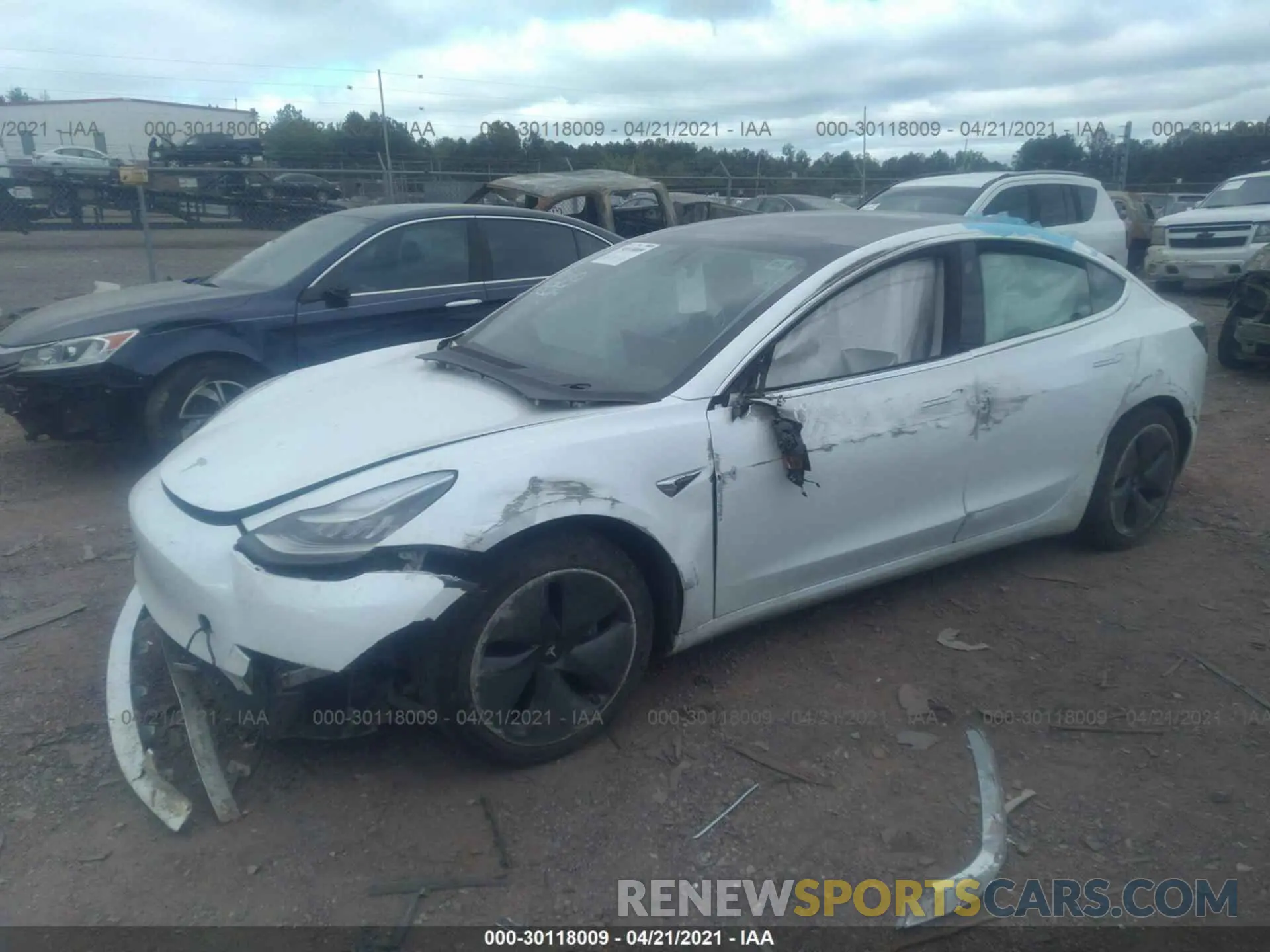 2 fotografías del automóvil dañado 5YJ3E1EB7KF452935 TESLA MODEL 3 2019