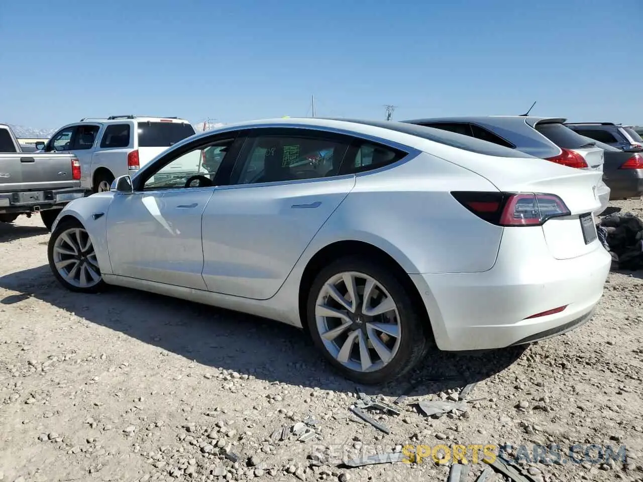 2 fotografías del automóvil dañado 5YJ3E1EB7KF453308 TESLA MODEL 3 2019