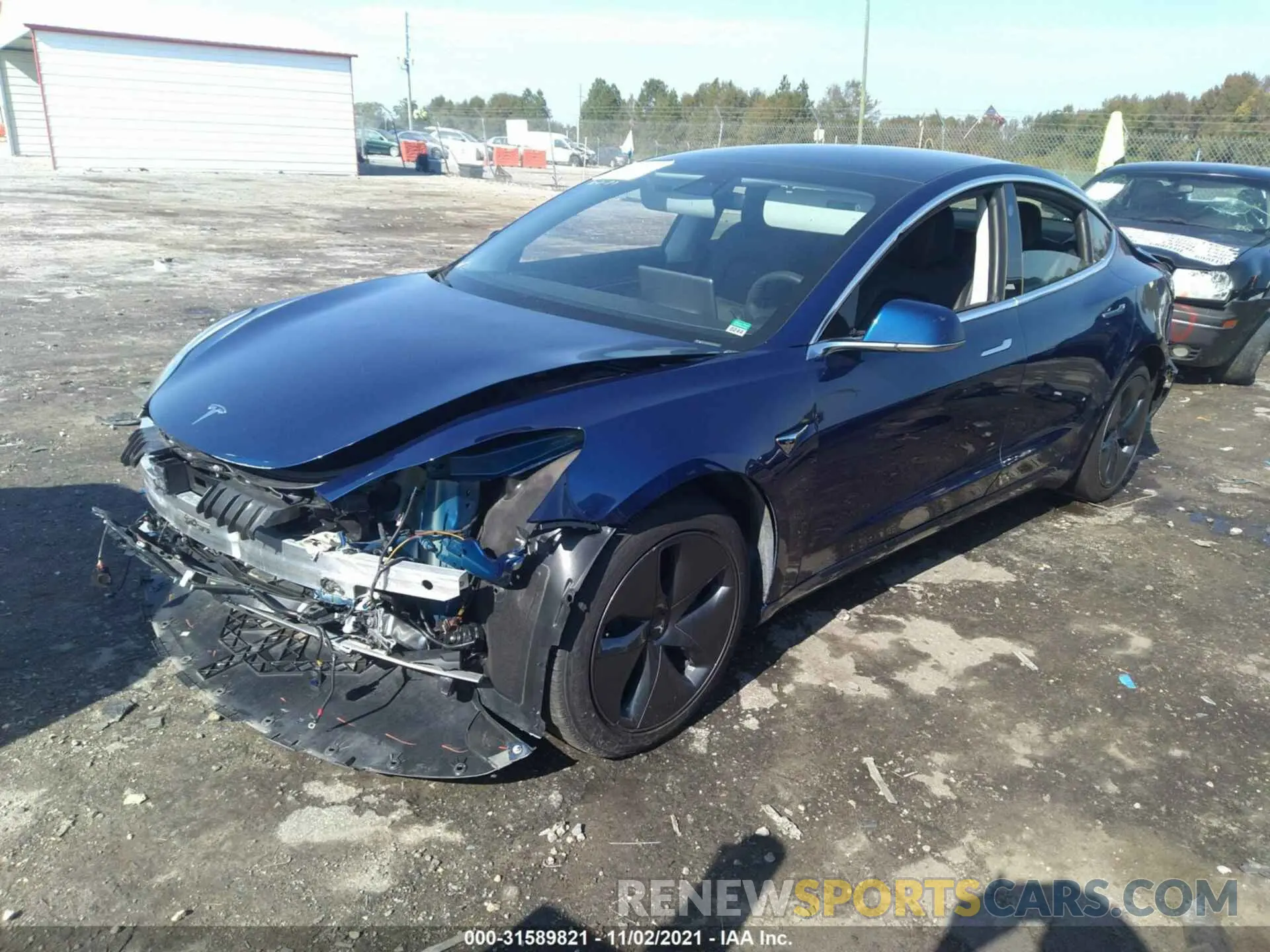 2 fotografías del automóvil dañado 5YJ3E1EB8KF533443 TESLA MODEL 3 2019