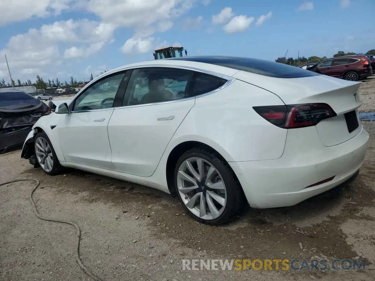 2 fotografías del automóvil dañado 5YJ3E1EB9KF469445 TESLA MODEL 3 2019