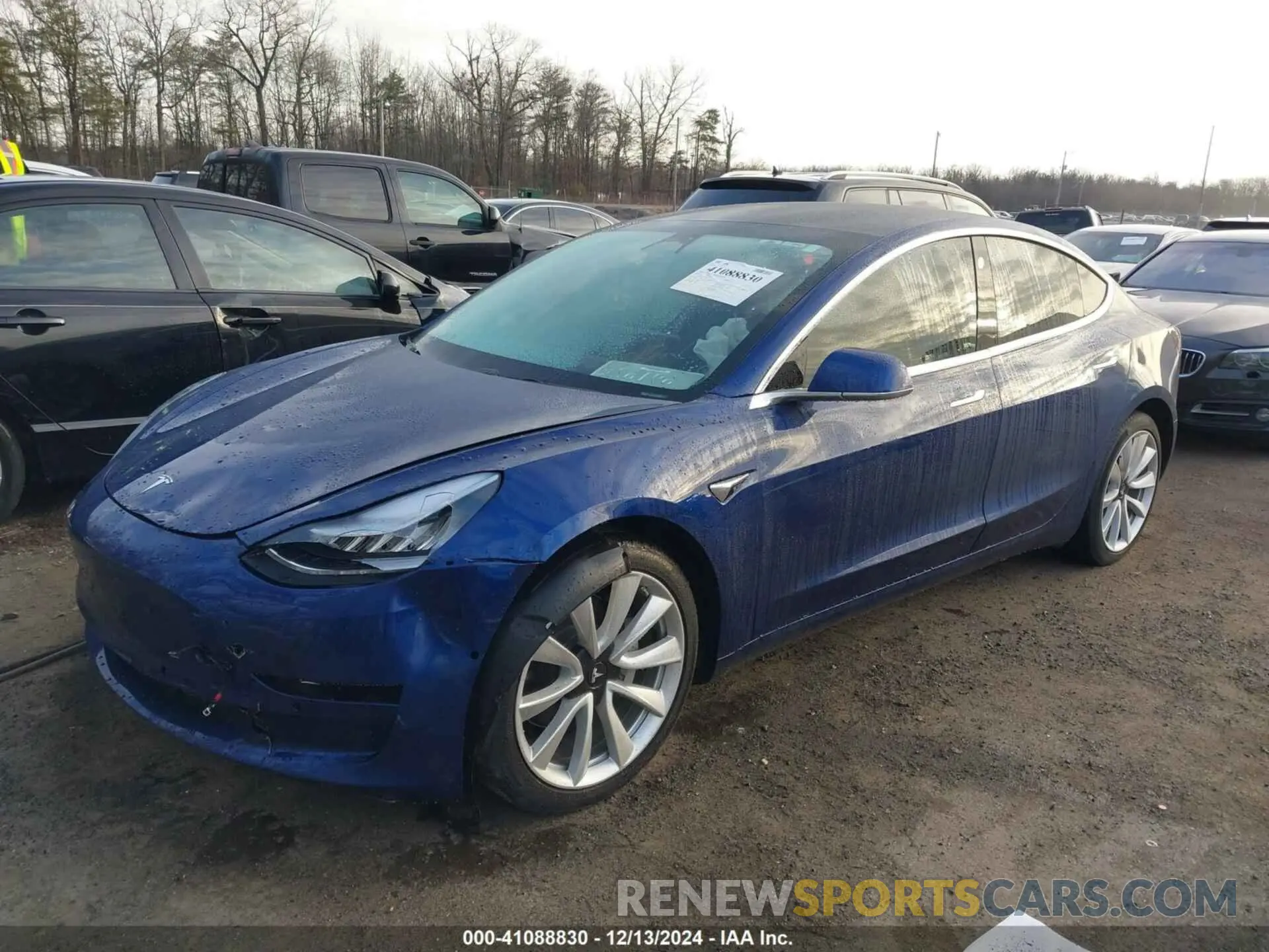 2 fotografías del automóvil dañado 5YJ3E1EB9KF477481 TESLA MODEL 3 2019
