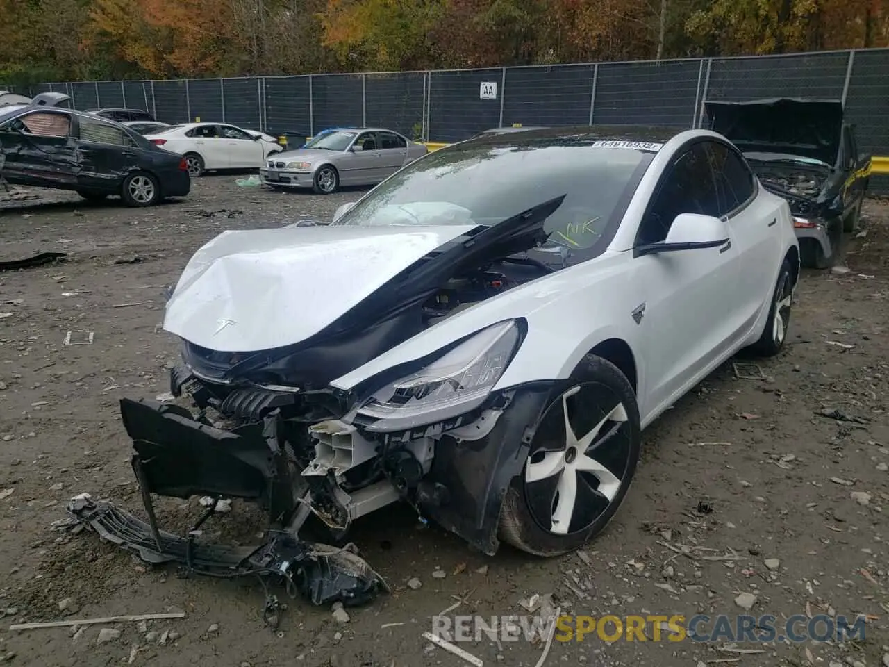 2 fotografías del automóvil dañado 5YJ3E1EB9KF493535 TESLA MODEL 3 2019
