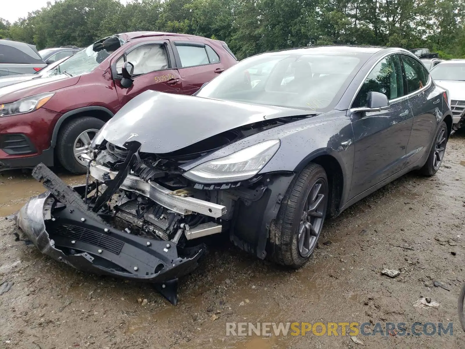 2 fotografías del automóvil dañado 5YJ3E1EBXKF205795 TESLA MODEL 3 2019