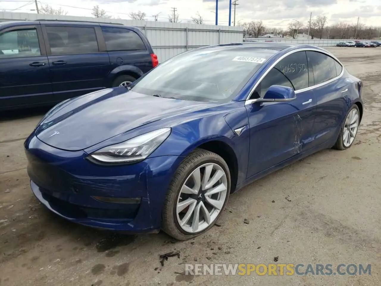 2 fotografías del automóvil dañado 5YJ3E1EBXKF453920 TESLA MODEL 3 2019