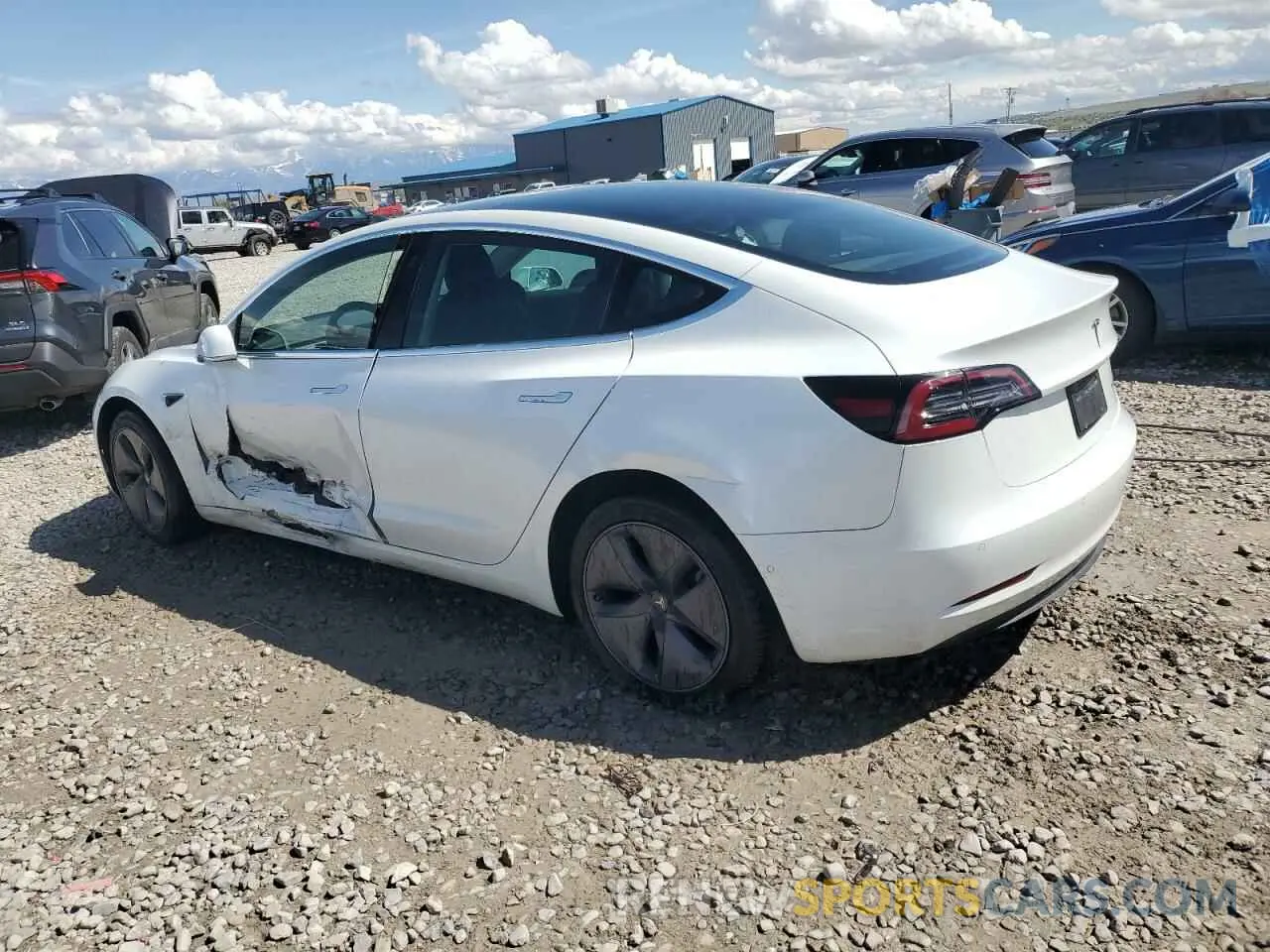 2 fotografías del automóvil dañado 5YJ3E1EBXKF494161 TESLA MODEL 3 2019