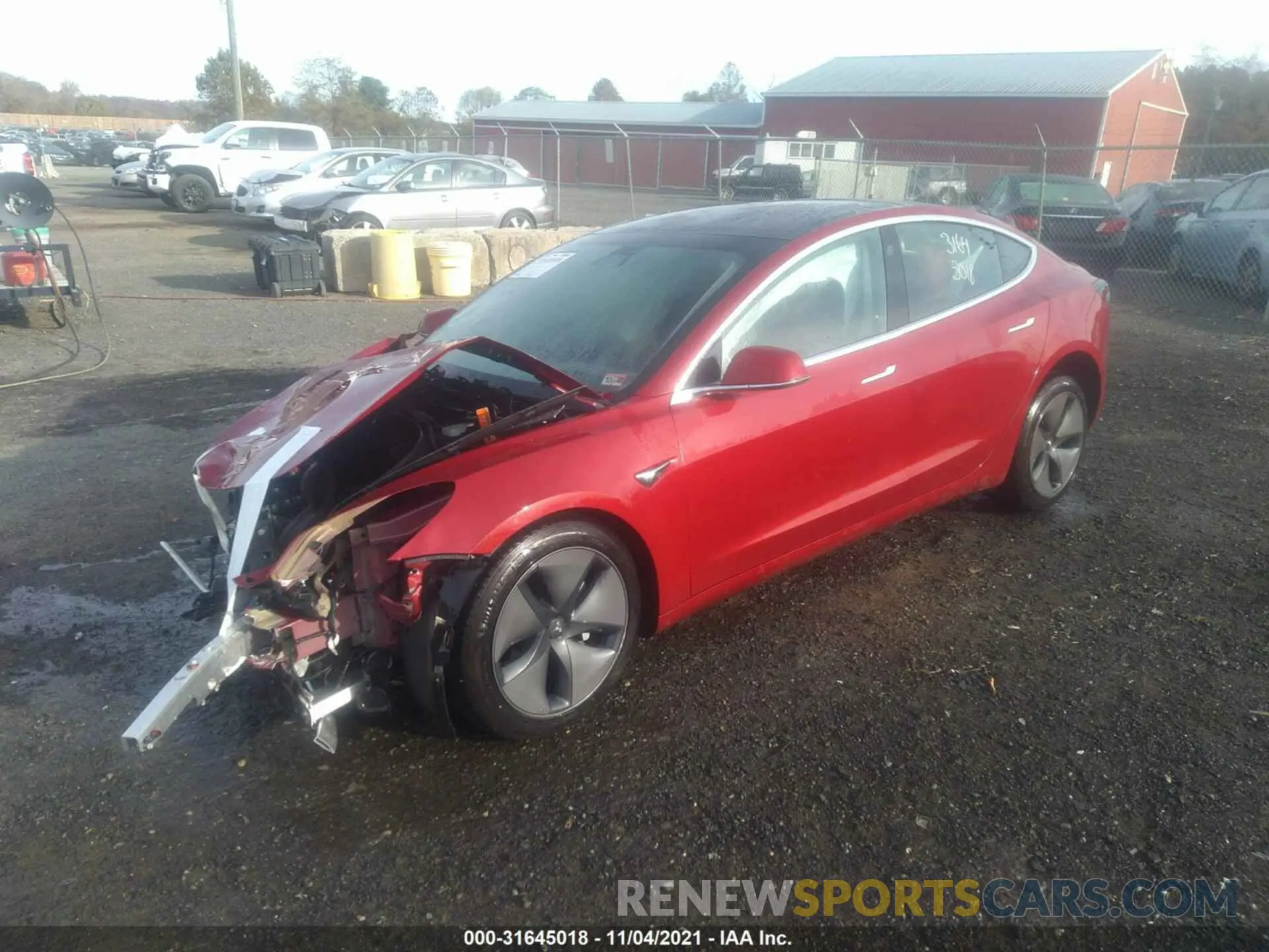 2 fotografías del automóvil dañado 5YJ3E1EBXKF497125 TESLA MODEL 3 2019