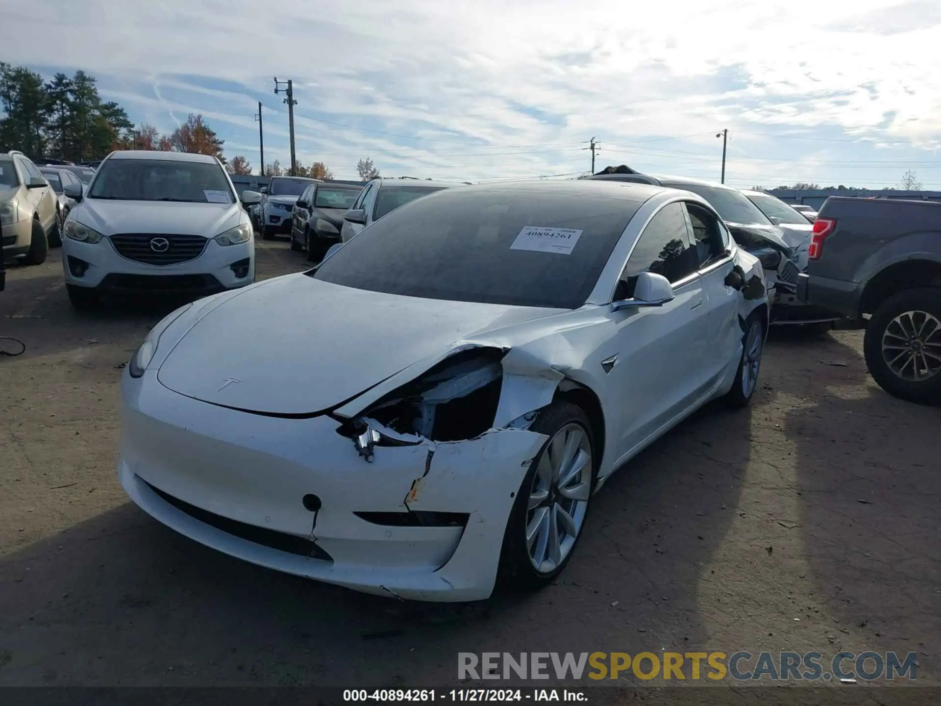 2 fotografías del automóvil dañado 5YJ3E1EA0LF798012 TESLA MODEL 3 2020