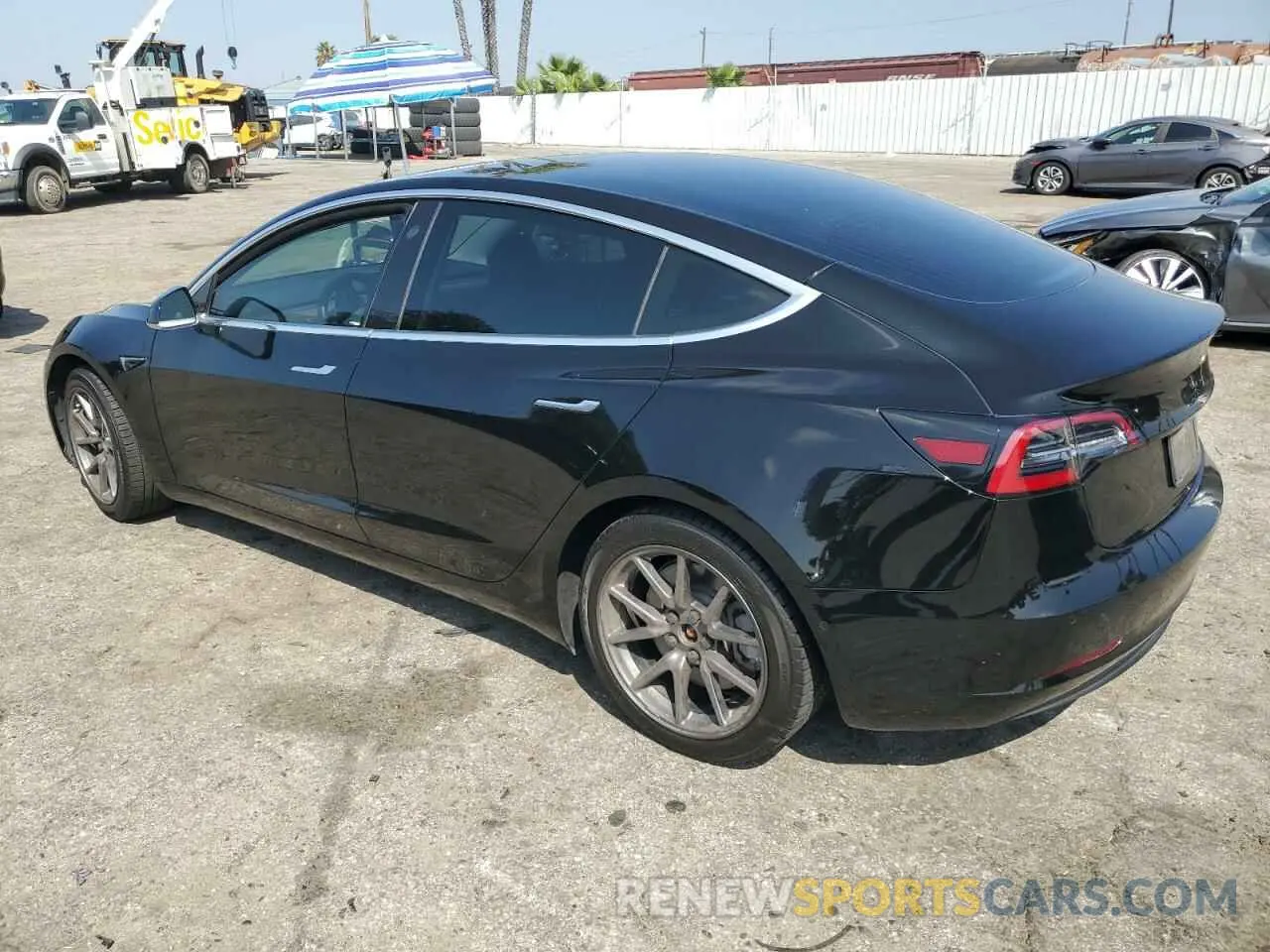 2 fotografías del automóvil dañado 5YJ3E1EA0LF802155 TESLA MODEL 3 2020