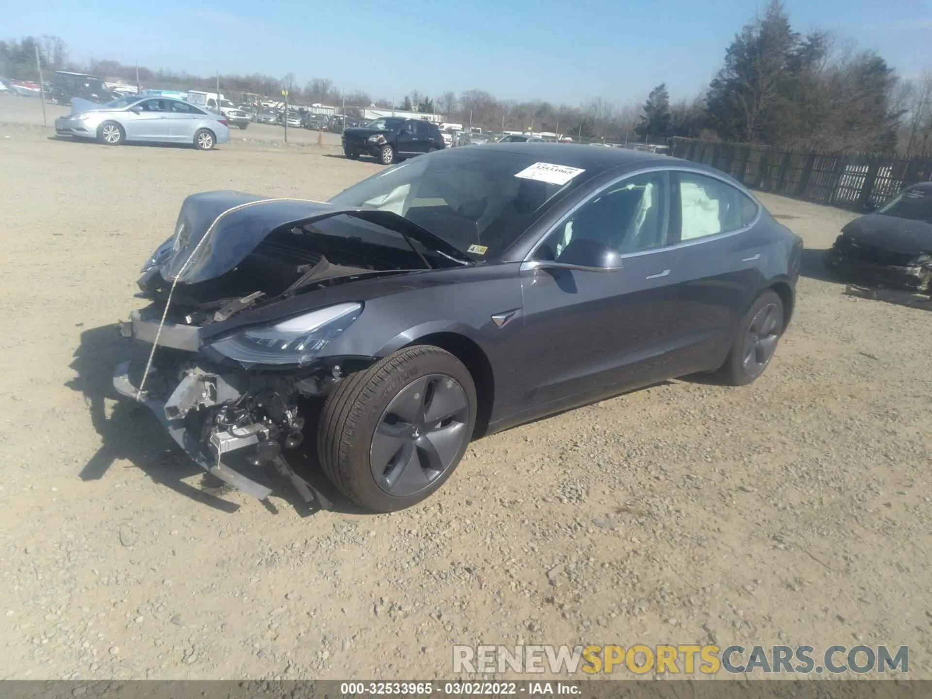 2 fotografías del automóvil dañado 5YJ3E1EA1LF704882 TESLA MODEL 3 2020