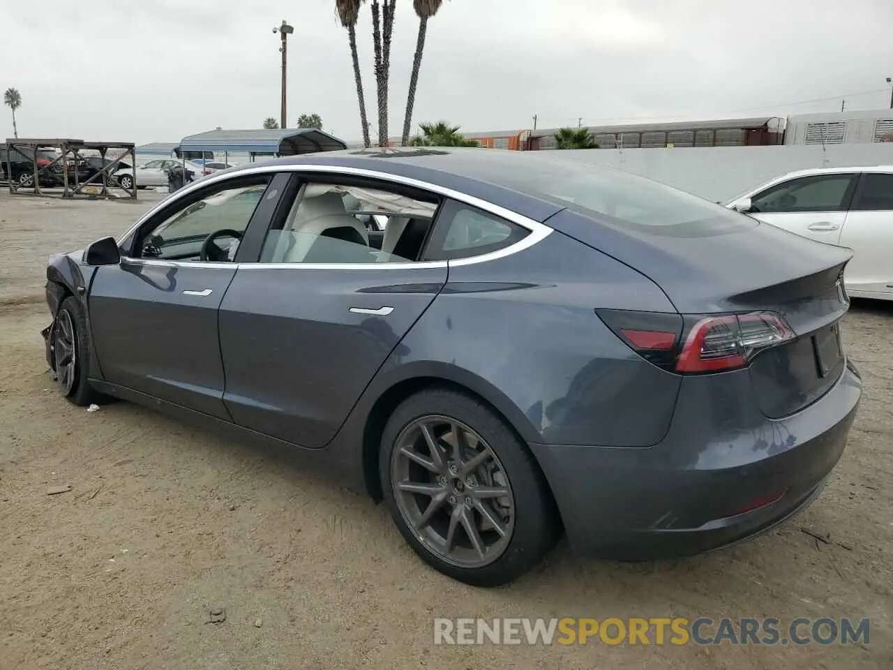 2 fotografías del automóvil dañado 5YJ3E1EA1LF746002 TESLA MODEL 3 2020