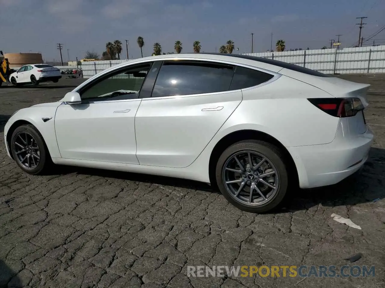 2 fotografías del automóvil dañado 5YJ3E1EA2LF598958 TESLA MODEL 3 2020