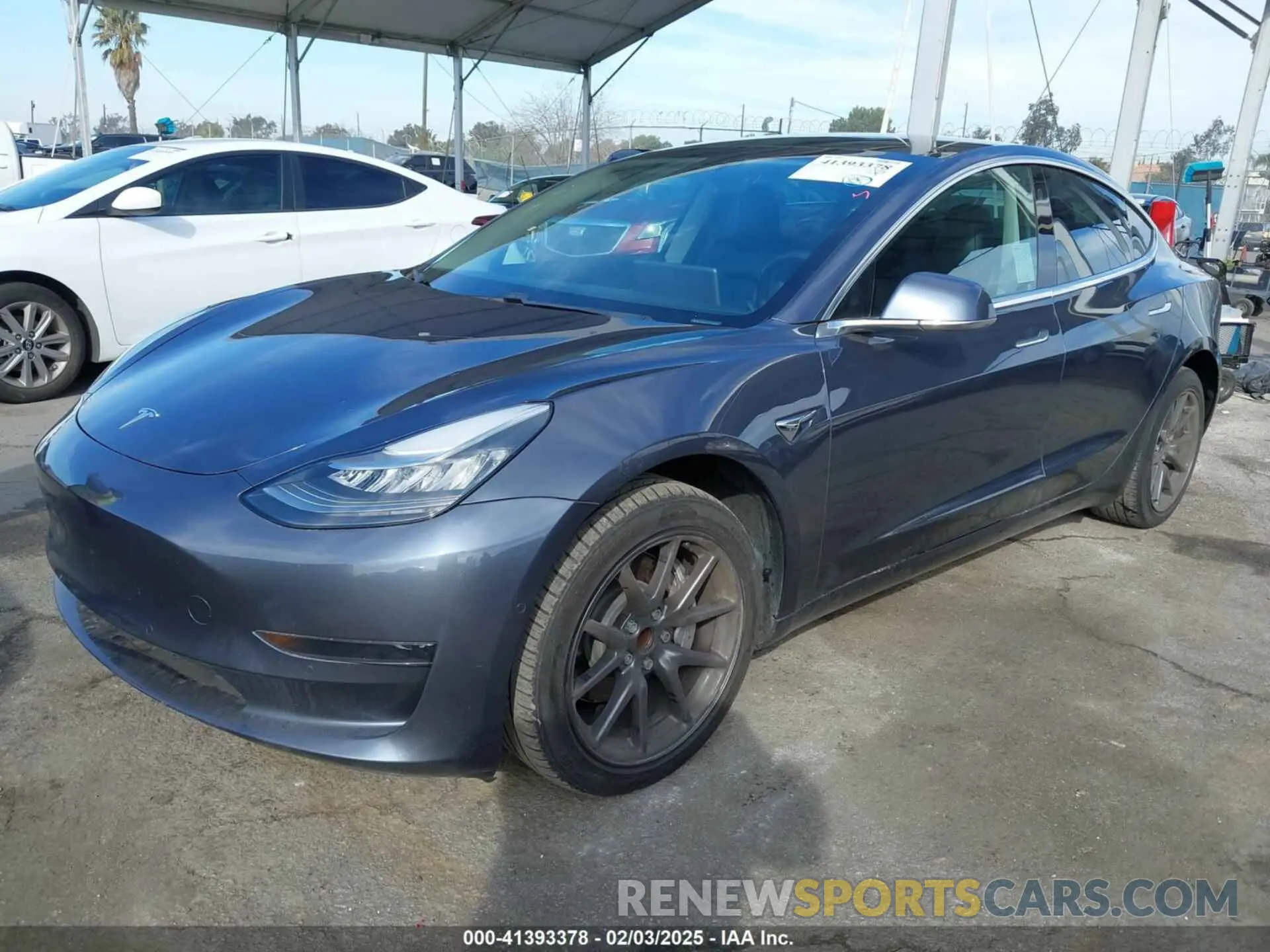 2 fotografías del automóvil dañado 5YJ3E1EA2LF631893 TESLA MODEL 3 2020