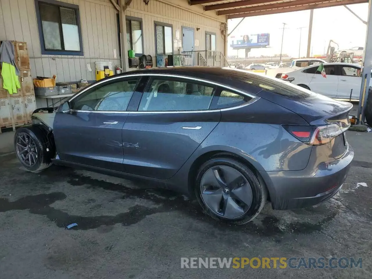 2 fotografías del automóvil dañado 5YJ3E1EA2LF705121 TESLA MODEL 3 2020