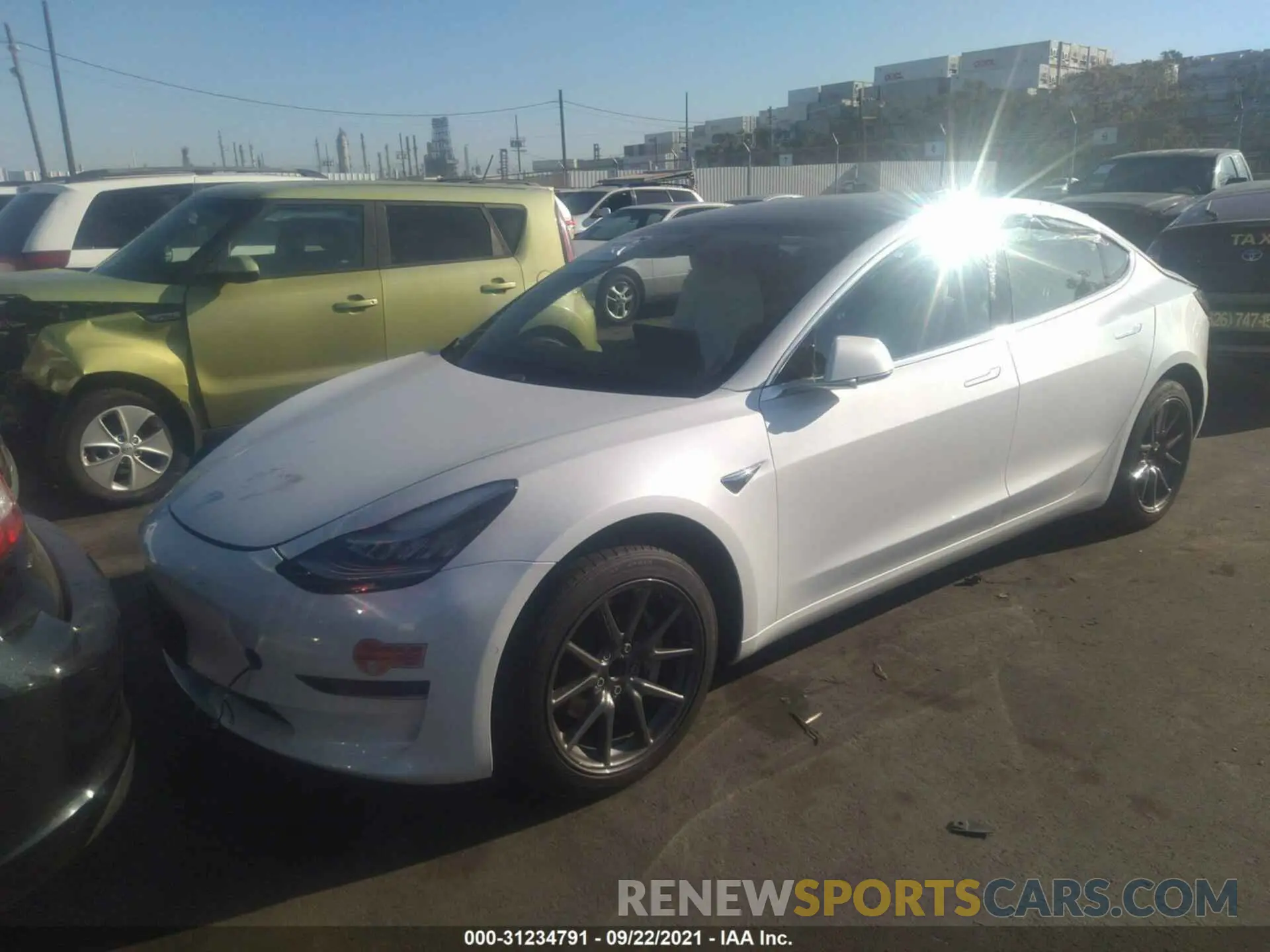 2 fotografías del automóvil dañado 5YJ3E1EA2LF710044 TESLA MODEL 3 2020