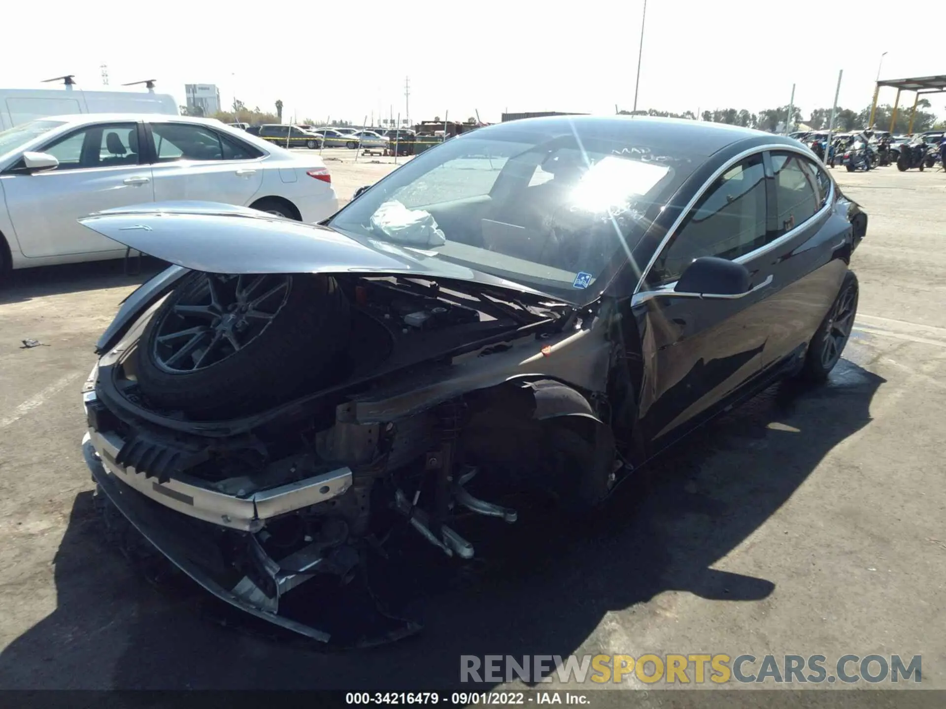2 fotografías del automóvil dañado 5YJ3E1EA2LF803310 TESLA MODEL 3 2020
