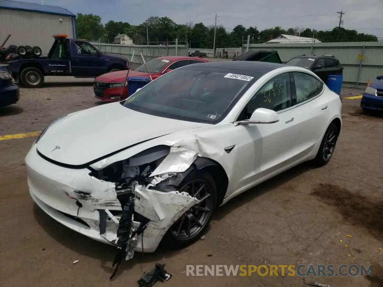 2 fotografías del automóvil dañado 5YJ3E1EA3LF632440 TESLA MODEL 3 2020