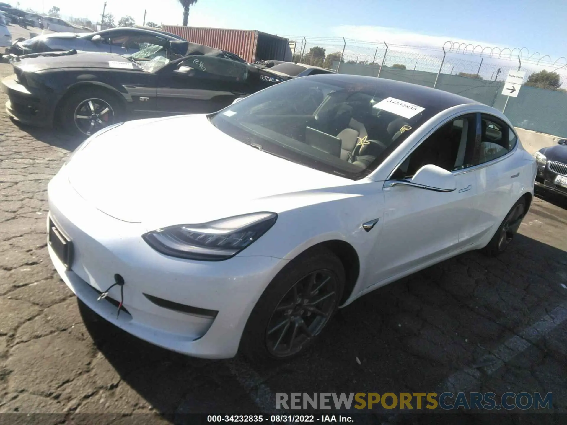 2 fotografías del automóvil dañado 5YJ3E1EA3LF634074 TESLA MODEL 3 2020