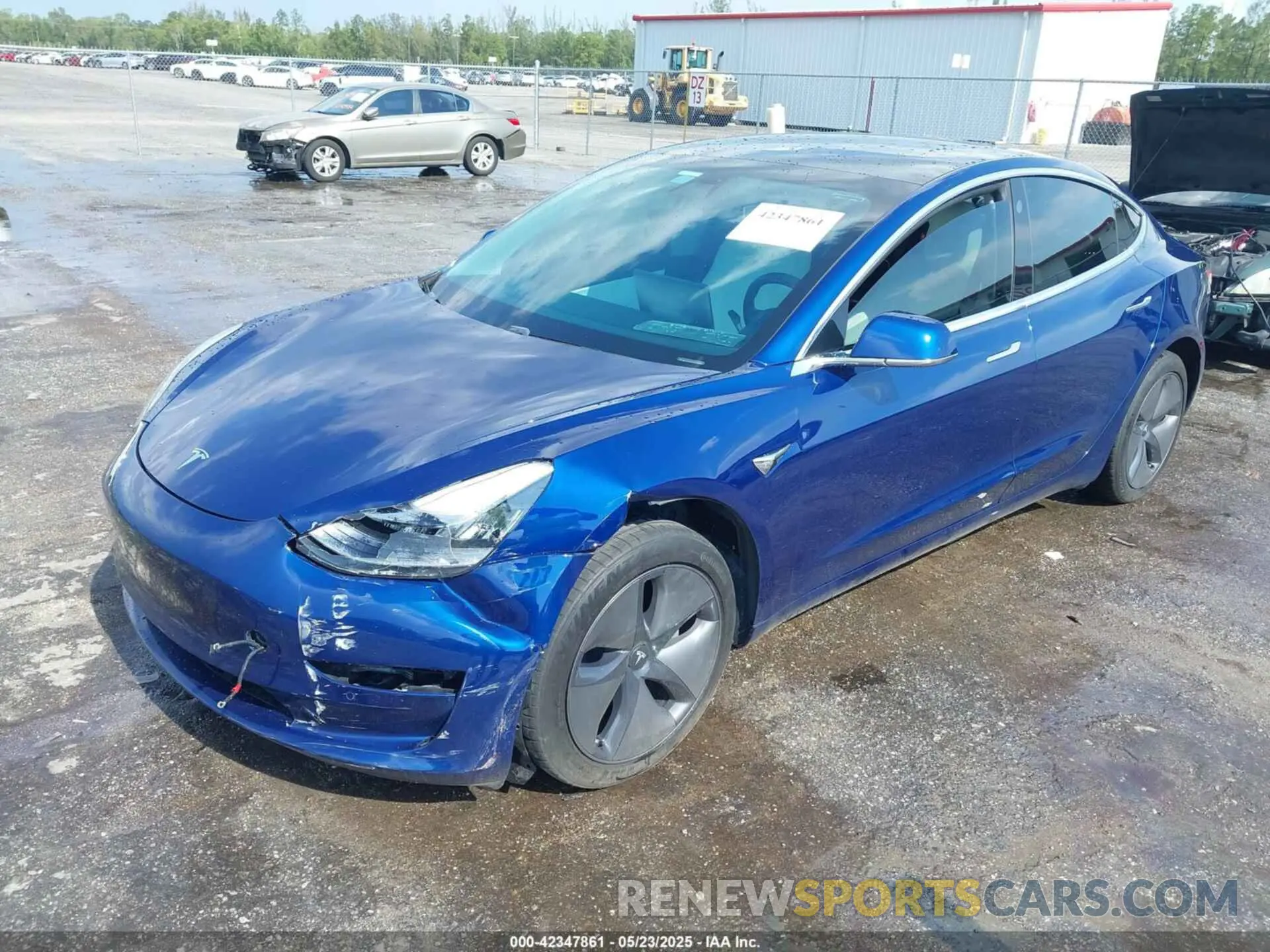 2 fotografías del automóvil dañado 5YJ3E1EA4LF591056 TESLA MODEL 3 2020