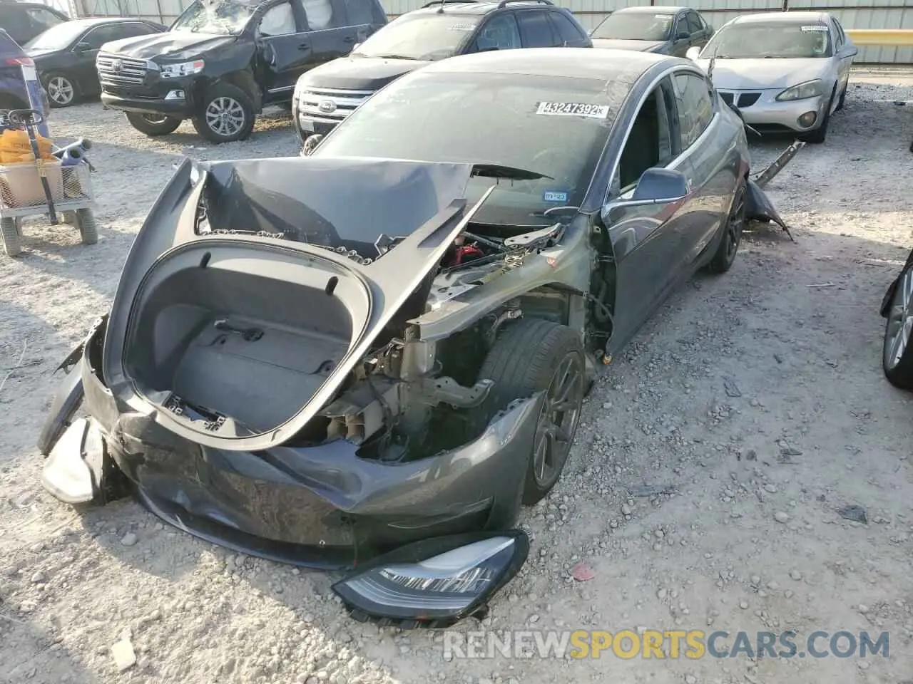 2 fotografías del automóvil dañado 5YJ3E1EA4LF611502 TESLA MODEL 3 2020