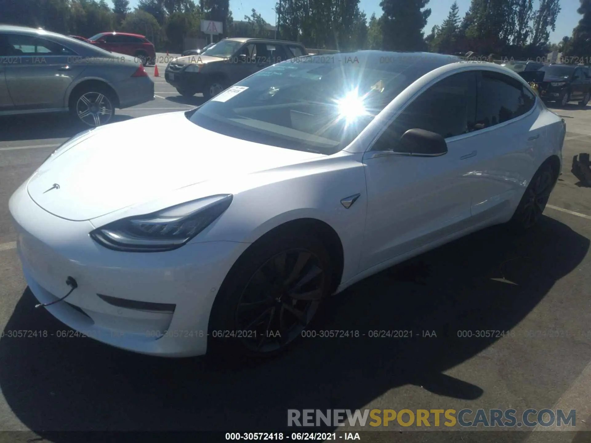 2 fotografías del automóvil dañado 5YJ3E1EA4LF642622 TESLA MODEL 3 2020