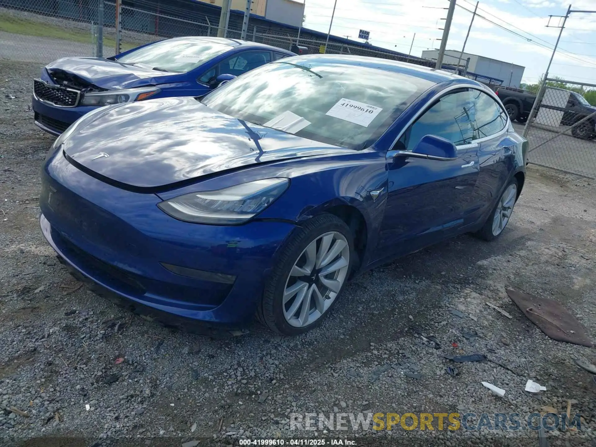 2 fotografías del automóvil dañado 5YJ3E1EA4LF661395 TESLA MODEL 3 2020